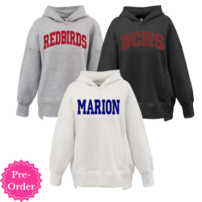 Women's oversized embroidered hoodie by Coyote Moon Design Company, featuring colorful embroidery and a relaxed fit.